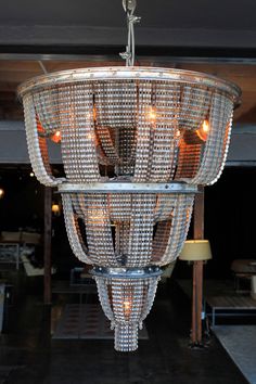 a chandelier made out of wine bottles