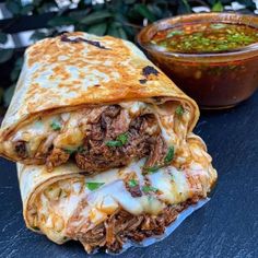 two burritos stacked on top of each other