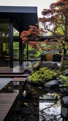 a japanese garden with rocks and trees