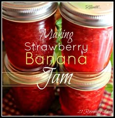 several jars filled with jam sitting on top of a table