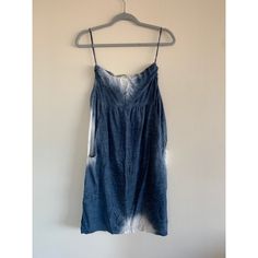 Sleeveless Tie-Dye Sundress Casual Tie Dye Mini Dress, Summer Washed Mini Dress, Indigo Cotton Mini Dress, Blue Cotton Unlined Dress, Blue Unlined Cotton Dress, Breezy Cotton Sleeveless Sundress, Blue Cotton Sleeveless Dress For Vacation, Casual Tie-dye Mini Dress, Breezy Sleeveless Cotton Sundress