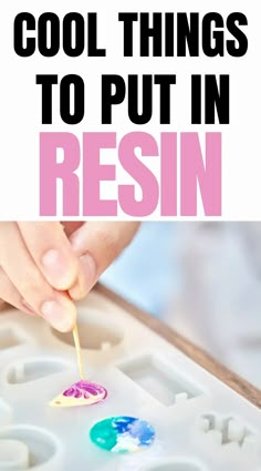 someone is painting the letters on an ice tray with blue and pink paint, while text reads cool things to put in resin