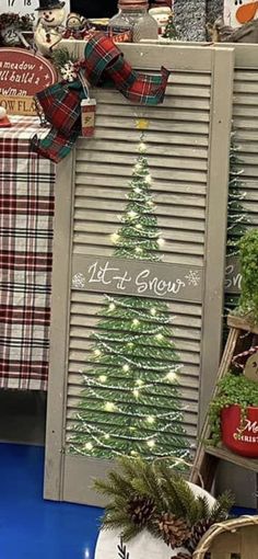 a christmas tree is on display in a store