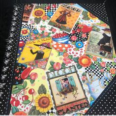 a table topped with lots of different pictures and designs on it's cloths