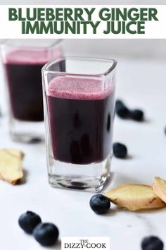 two glasses filled with blueberry ginger juice