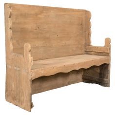 an old wooden bench that has been turned into a seat for someone to sit on