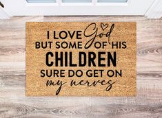 a door mat that says i love god but some of his children sure do get on my