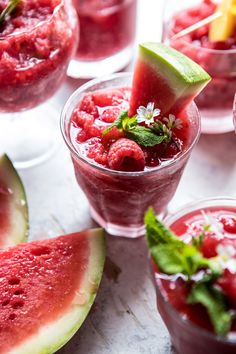 watermelon and raspberry smoothie in glasses with mint garnish