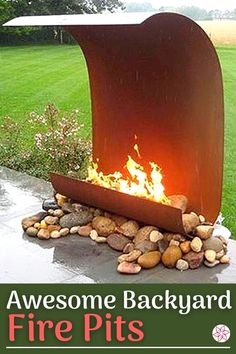 an outdoor fire pit with rocks in the foreground and grass in the background text reads, awesome backyard fire pits