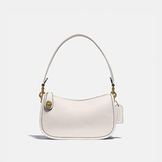 The Swinger Bag is part of The Coach Originals, a collection of archival-inspired bags that celebrates our legacy and authentic New York heritage. This streamlined glovetanned leather style is based on a 1980s Coach design reimagined for today. Featuring our iconic turnlock closure, the zip-top short-strap shoulder bag sits just beneath the underarm for hands-free convenience and includes a detachable strap to wear crossbody. Some styles are just too good to leave in the archives. Quinceñera List, White Classic Baguette Bag, Classic Crossbody Shoulder Bag With Arcuate Strap, Classic Handheld Baguette Bag With Adjustable Strap, Classic White Baguette Bag, Classic Formal Baguette Bag With Adjustable Strap, Classic White Baguette Bag With Detachable Strap, Classic Evening Baguette Bag With Detachable Strap, Classic Evening Shoulder Bag With Arcuate Strap