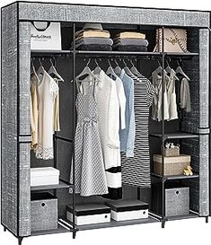 an open closet with clothes and other items