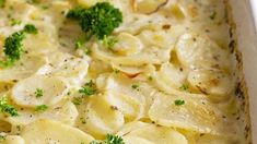 a casserole dish with pasta and broccoli