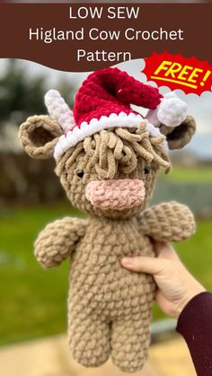 a hand holding a small stuffed animal wearing a santa's hat with text overlay reading low sew highland cow crochet pattern