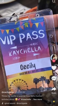 a person holding up a plastic badge with the name of their trip pass on it