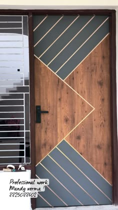 the front door is decorated with wood and metal strips