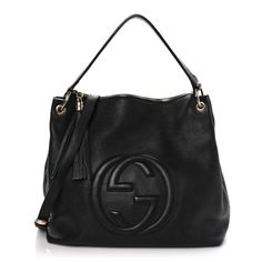 This is an authentic GUCCI Pebbled Calfskin Large Soho Hobo in Black. This stylish shoulder bag is crafted of soft pebbled calfskin leather in black. The bag features a leather top handle, an optional adjustable leather shoulder strap with brass links, a tassel zipper pull, and a stitched interlocking G logo on the front. The top zipper opens to a natural fabric interior with zipper and patch pockets. G Logo, Oversized Bag, Dior Jewelry, Versace Bags, Stylish Shoulder Bag, Natural Fabric, Wallet Fashion, Hobo Handbags, Pump Sandals