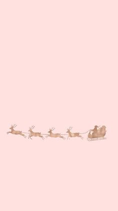 a line of reindeers running across a light pink background in the shape of a santa claus sleigh