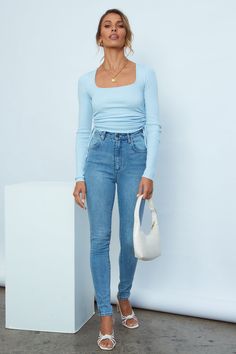 Length: Inside leg: 69cm; Front rise: 27cm; Leg cuff: 26cm (of size 8). Medium blue jeans. High-rise, skinny fit. Non-lined. Cold machine wash. Model is a standard XS and is wearing a size 6. True to size. Slightly stretchy mid-weight cotton denim. Belt-loops. Zip fly and branded button shank. Four-pocket design; branded rear pocket. Silver-tone hardware. 98% Cotton/ 2% Elastane. Made with BCI (Better Initiative Cotton). Designed to cater to all corners of your casual edit, Wrangler's iconic Hi Yemen Clothing, Leopard Print Boots, Vintage Band Tees, Band T Shirts, Boot Print, Leg Cuffs, Long Sleeve Knit Tops, Vintage Band, The Energy