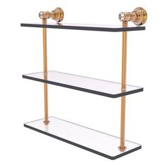 two tiered glass shelves with brass handles and metal bars on each shelf, against a white background