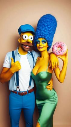 a man and woman dressed as simpsons and the simpsons is holding a doughnut in their hands