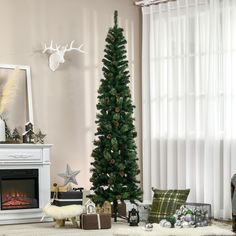 a living room with a christmas tree, fireplace and other holiday decorations on the floor