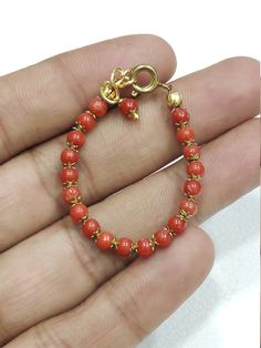 100% Red Coral Baby Bracelet New Baby Born-Italy Coral Lucky Charm Handmade 14k Gold Filled Bracelet for Baby Protection-Baby Shower Gift About Item  .; Adjustable :- 3.5 Inch To 4 Inch Adjustable Stone : Natural Red Coral Material ; Gold Brass  Weight : 10.5 Cart Approx. Payment policy We accept the payment via PayPal only. Shipping policy We Ship the item as per our shipping policy once we receive the payment. We understand that getting your items quickly is important to you, so we make every Gold Bracelets With Red Coral As Gift, Gold Red Coral Bracelets As Gift, Gold Red Coral Bracelets For Gifts, Gold Red Coral Bracelet As A Gift, Gold Red Coral Bracelet For Gift, Baby Bracelet, Baby Protection, Baby Born, Lucky Charm