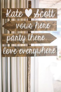 a wooden sign that says kate scott vows here party there love everywhere