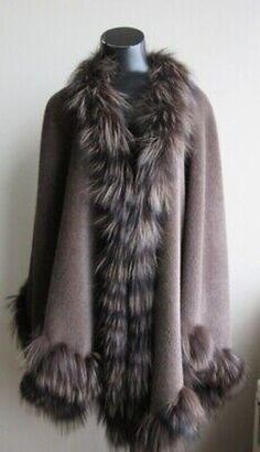 Item Description: Brand new and stylish Alpaca Wook Cape Shawl Wrap with smokey gray dyed silver fox fur trims. Sweep 190" MADE IN ITALY LENGTH: 31 " Grey Dye, Cape Wrap, Cape Shawl, Wool Shawl, Silver Fox, Shawl Wrap, Alpaca Wool, Fox Fur, Fur Trim