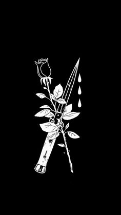 a black and white drawing of a rose with a pair of scissors