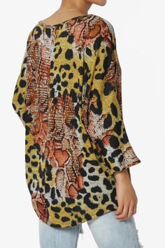 Printed Dolman Sleeve Pullover Top – Effortlessly stylish, this lightweight, stretch Hacci knit top features chic leopard, floral, polka dot, and chevron prints. With a relaxed fit, hi-low hem, and boat neck, it’s perfect for casual wear, office days, or travel. Wear with skirts or tailored pants or denim for versatile, everyday style. Lightweight Draped Knit Top – Featuring trendy leopard, floral, chevron and polka dot prints for casual or travel looks. Comfortable 3/4 Sleeve Pullover – Perfect Oversized All Over Print Tops For Spring, Oversized Spring Tops With All Over Print, Oversized Tops With All Over Print For Spring, Leopard Print Blouse For Fall, Leopard Print Tops For Spring, Oversized Leopard Print Top, Chic Printed Tops For Loungewear, Chic Multicolor Tops For Loungewear, Patterned Tops With Mixed Print For Fall