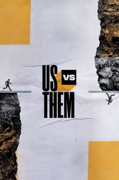 two people on skis in front of a poster with the words us and them