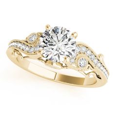 a yellow gold engagement ring with diamonds