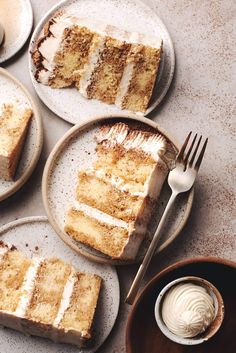 four plates with slices of cake on them