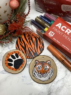 Artistro paint pens create stunning works of art on a variety of surfaces. Crafts With Wood Slices, Disc Painting, Crafts With Wood, Tiger Painting, Detail Oriented