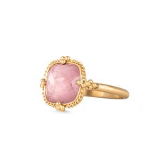 Bringing to mind the first signs of Spring, this Morganite is a lovely shade of petal pink. This ring is complete with a handmade bezel that encases this gem with a yellow gold radiance. One of a kind.Ready to ship in size 7. Please allow 1-2 weeks for any other size. Technical Details Metal: 18k yellow goldMorganite: 4.17 cts. Ring face: 13.5mm x 13.5mmBand width: 2mmHandmade in New YorkStyle # R-2721-MOR Luxury Pink Sapphire Rings With Gemstone, Elegant Tourmaline Gemstone With Center Stone, Elegant Pink Gold Morganite Rings, Luxury Tourmaline Rings With Rose Cut Diamonds, Luxury Pink Gold Ring With Pink Sapphire, Exquisite Gold Morganite Ring, Heirloom Morganite Jewelry In Yellow Gold, Luxury Pink Tourmaline Rings, Elegant Yellow Gold Sapphire Cabochon Ring