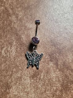 "If you want a different color gem, put it in the personalization box and I will switch it if I have it Looking for a beautiful and feminine piece of jewelry to add to your belly piercing? Look no further than this stunning butterfly belly ring, featuring a delicate pink gemstone!  Measures about 1 3/4\". 14g 5/8\" **Great gift for yourself or a friend!  Choose the gift message option when you check out if you want me to include a FREE gift bag.**" Dainty Internally Threaded Belly Rings As Gift, Hypoallergenic Silver Belly Rings As Gift, Hypoallergenic Silver Belly Rings For Gift, Adjustable Dangle Belly Rings As Gift, Nickel-free Dangle Belly Rings As Gift, Dangle Body Jewelry For Gifts, Dainty Nickel-free Belly Rings As Gift, Sterling Silver Dangle Belly Rings For Gift, Nickel Free Dangle Belly Rings Gift