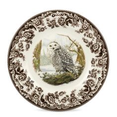 a plate with an owl sitting on top of it