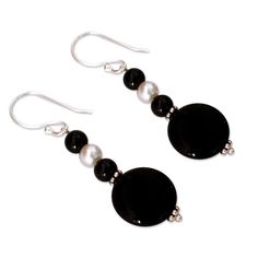 Illuminated by a single white pearl, black onyx whispers of midnight kisses. These beautiful earrings are designed by India's Narayani. Black Pearl Drop Party Jewelry, Black Pearl Drop Jewelry For Party, Black Pearl Drop Round Jewelry, Black Round Pearl Drop Jewelry, Black Sterling Silver Pearl Earrings For Formal Occasions, Black Pearl Earrings For Gift, Classic Black Pearl Drop Jewelry, Classic Black Pearl Drop Earrings, Black Pearl Drop Jewelry For Gift