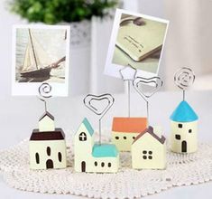 an ebay card with houses and hearts on it