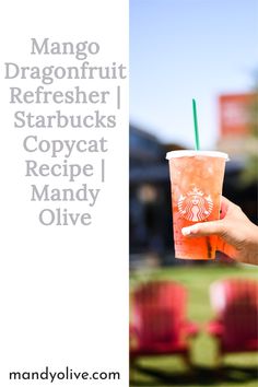 a person holding up a starbucks drink with the words, mango dragonfruit refresher starbucks copycat recipe / mandy olive