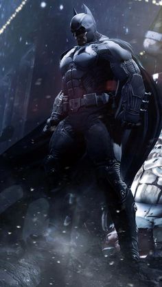 a batman standing next to a bat in the snow