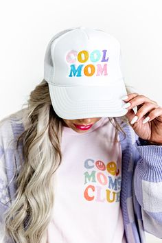 -Fun embroidered lettering " Cool Mom " -Seamless foam front panel with breathable mesh backing -Adjustable snap closure White Mesh Snapback Hat With Visor, White Mesh Visor Baseball Cap, White Mesh Visor Hat, White Mesh Baseball Cap With Curved Brim, White Cotton Trucker Snapback Hat, White Mesh Trucker Hat With Curved Visor, White Trucker Hat For Summer, White Mesh Hat With Curved Brim, Summer White Mesh Hats