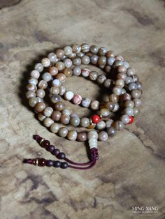 ✼Product info✼ Diameter: 9mm Spacer: Cinnabar Head: Semi precious stone Tail: Agate stone We have 5 vintage agate mala(mark as #7 to 11). Every each has their own charm. (Slightly different color and design). (#7) https://www.etsy.com/listing/835222557/vintage-9mm-agate-108-mala-prayer-beads?ref=listings_manager_table (#8) https://www.etsy.com/listing/821331614/vintage-9mm-agate-108-mala-prayer-beads?ref=listings_manager_table (#9) https://www.etsy.com/listing/821331614/vintage-9mm-agate-108-mal Manager Table, Buddhist Jewellery, Table 8, Buddhist Meditation, 108 Mala Beads, Semi Precious Stone, Banded Agate, Mala Beads, Prayer Beads