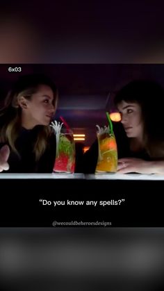 two women sitting at a table with drinks in front of them and the caption do you know any spells?