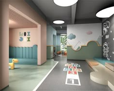 the interior of a children's playroom with toys on the floor and walls