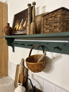 a shelf with baskets and other items on it