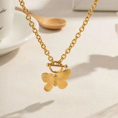 LOVCIA 18K Gold Plated Butterfly Pendant Necklace for Women - Elegant and Stylish Jewelry Gift for Her, Perfect for Everyday Wear and Special Occasions Elevate your style with the LOVCIA 18K Gold Plated Butterfly Pendant Necklace for Women. This exquisite piece features a beautifully crafted butterfly pendant, symbolizing transformation and grace. This durable necklace is designed with a sturdy cable chain, making it perfect for daily wear or special occasions. Its luxurious gold finish ensures Black Friday Jewelry, Jewelry Organizer Storage, Chain Making, Butterfly Pendant Necklace, Wear Necklaces, Mens Beaded Bracelets, Earring Sale, Unique Pendant, Butterfly Necklace