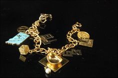 This is a very beautiful, very unique and vintage GF STERLING LINK  charms bracelet. The bracelet has marvelous 9 charms with zodiac, happy birthday, Indiana state, I AM LOVED, locked, college cap, sky girl and gilt starling, gold filled. The bracelet has a very exotic and elegant feel to it. It measures 7" long. The bracelet is in very good condition. 0.7 MR I Am Loved, Indiana State, Charms Bracelet, Locket Charms, Starling, Charm Bracelets, Link Bracelets, Locket, Silver Fashion