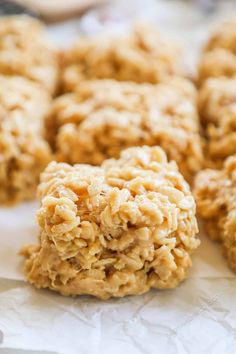 some oatmeal cookies sitting on top of a piece of paper