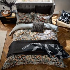 The Ted Baker feathers collection flaunts off daring opulence. A detailed feather pattern pops in various colors of black, cream, brown, and orange for a warm, cozy feel. Packaged in a reusable self-fabric bag with sustainability in mind. Size: King Comforter + 2 Standard Shams | Ted Baker Feathers Sateen Comforter Set Polyester / Polyfill / Cotton Sateen in Black / Brown | King Comforter + 2 Standard Shams | Wayfair | Home Decor Feather Comforter, Traditional Duvet Covers, Contemporary Duvet Covers, Orange Home Decor, King Size Duvet, Brown And Orange, King Comforter Sets, Print Comforter, Feather Pattern